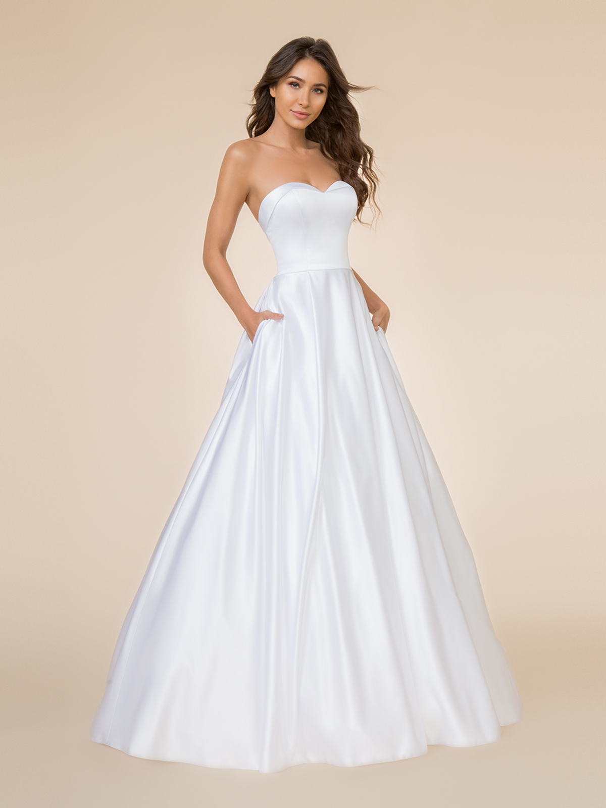 Bride wearing an elegant A-line wedding dress with a sweetheart neckline