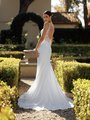 Back View of Bride in Moonlight Collection J6931 Deep Illusion V-Back with Sweep Cutout Lce Train