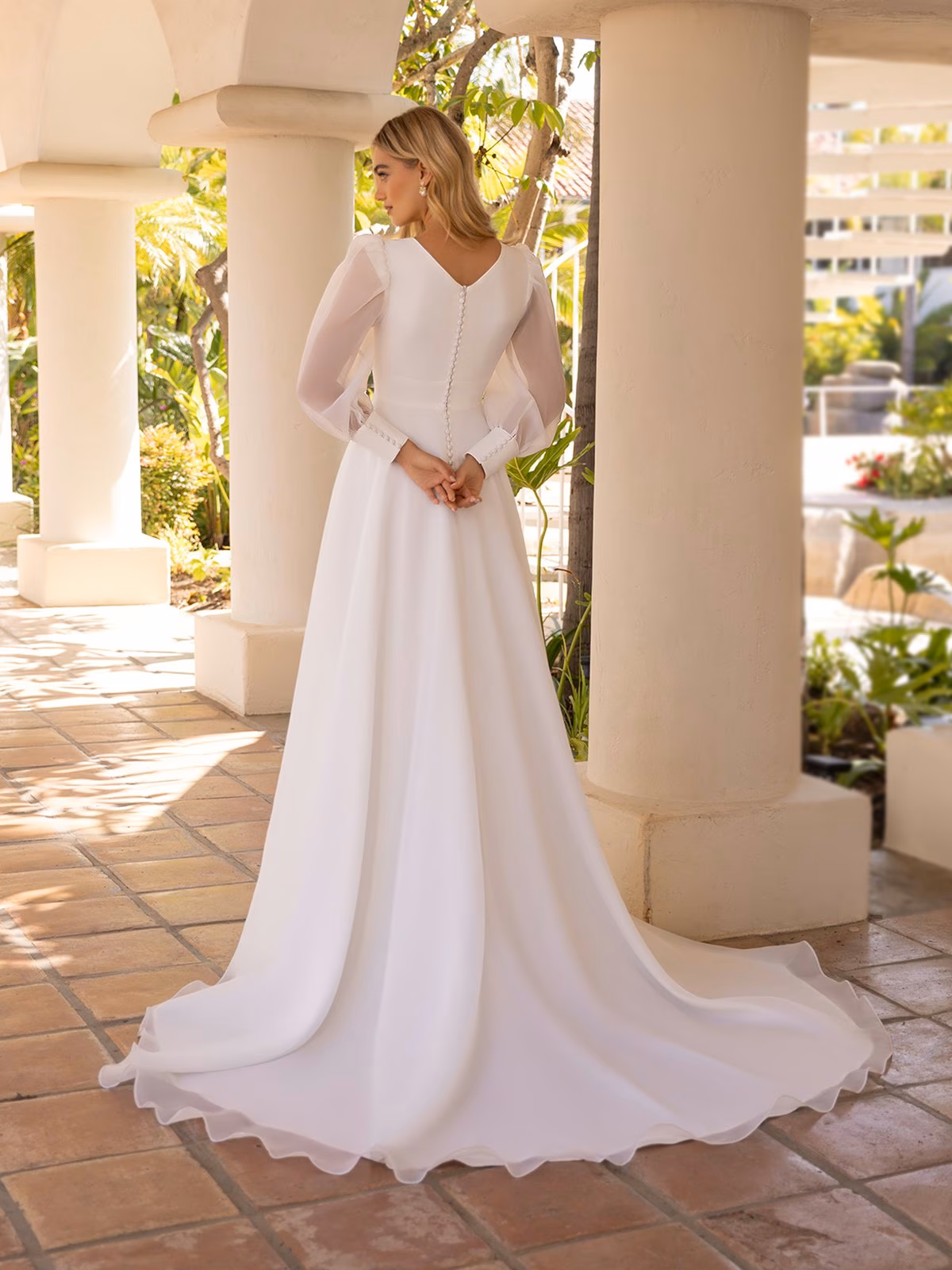 Style M5104 Long bishop organza sleeves with crepe cuffs wide V-back A-line with buttons along zipper