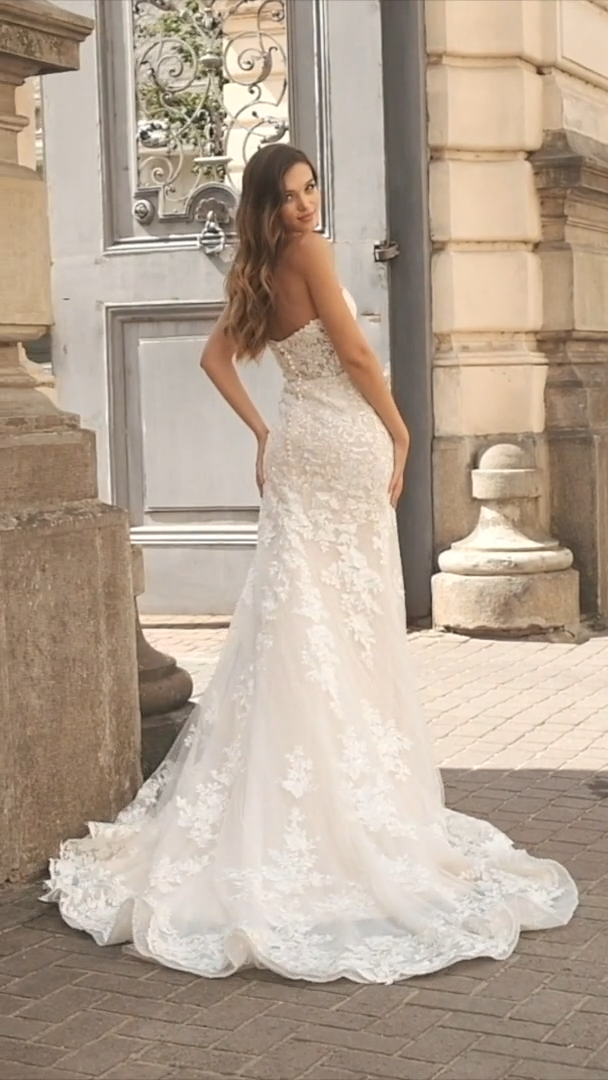 Moonlight Couture H1461 Illusion Open Back Beaded Lace Wedding Gown with Covered Buttons Along Zipper Moonlight Couture H1461 Illusion Open Back Beaded Lace Wedding Gown with Covered Buttons Along Zipper