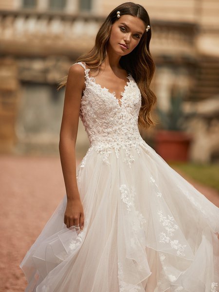 Moonlight Couture H1465 Beaded Deep V-Neck with Illusion Inset Gown with Bouquet Lace Appliques and Straps Moonlight Couture H1465 Beaded Deep V-Neck with Illusion Inset Gown with Bouquet Lace Appliques and Straps