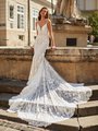 Moonlight Couture H1488 romantic lace wedding dresses with sleeves and beading make a statement.