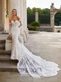 Moonlight Couture H1490 romantic lace wedding dresses with sleeves and beading make a statement.