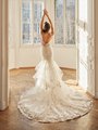 Moonlight Couture H1501 romantic lace wedding dresses with sleeves and beading make a statement.