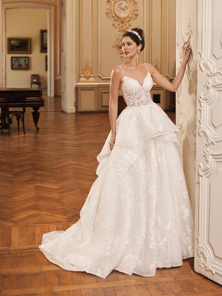 Moonlight Couture H1502 romantic lace wedding dresses with sleeves and beading make a statement.