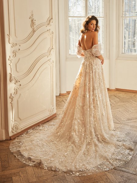Moonlight Couture H1503 romantic lace wedding dresses with sleeves and beading make a statement.