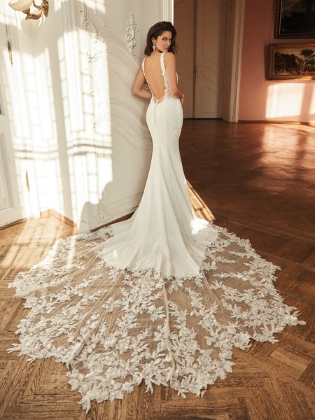 Moonlight Couture H1506 romantic lace wedding dresses with sleeves and beading make a statement.