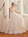 Moonlight Couture H1510 romantic lace wedding dresses with sleeves and beading make a statement.