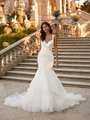 Moonlight Couture H1523 romantic lace wedding dresses with sleeves and beading make a statement.