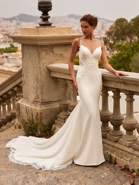 Moonlight Couture H1526 romantic lace wedding dresses with sleeves and beading make a statement.