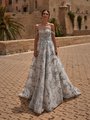 A Bride Walks In Multi Colored Floral Lace Wedding Dress With Swag Sleeves
