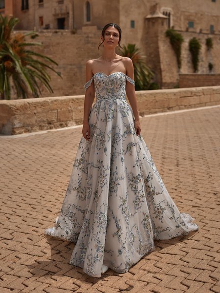 Moonlight Couture H1561 romantic lace wedding dresses with sleeves and beading make a statement. Moonlight Couture H1561 romantic lace wedding dresses with sleeves and beading make a statement.