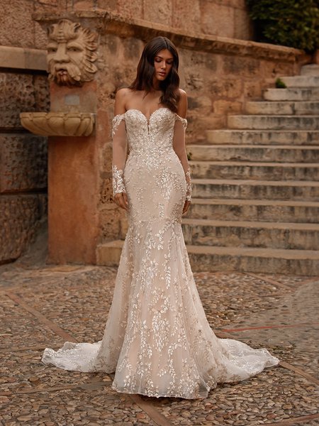 Moonlight Couture H1562 romantic lace wedding dresses with sleeves and beading make a statement.
