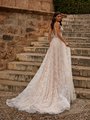 Bride Walking In A Beaded A-line Wedding Dress With Chapel Train