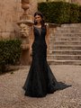 Bride Wearing Sparkly Black Lace Wedding Dress With Bateau Neckline