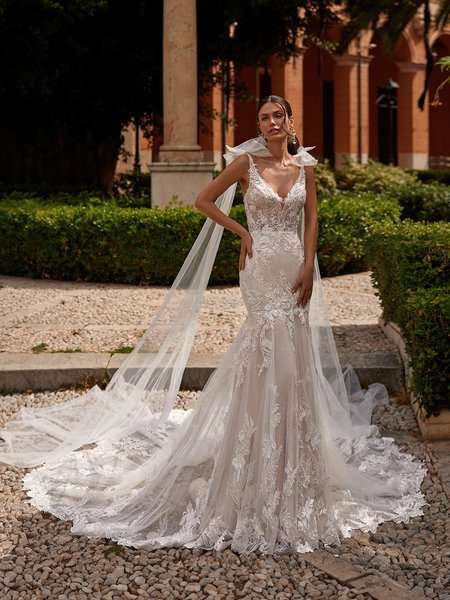 Moonlight Couture H1568 romantic lace wedding dresses with sleeves and beading make a statement.