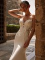 Closeup Shot Of Bride In Sweetheart Crepe Wedding Dress With Illusion Cutouts At Waist