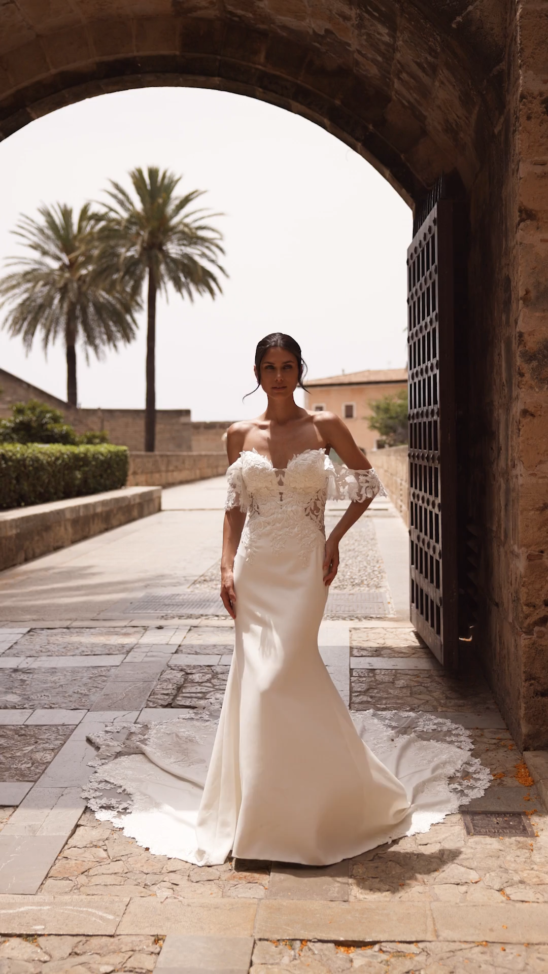 Bride In A Crepe Mermaid Wedding Dress With Lace Off The Shoulder Swag Sleeves