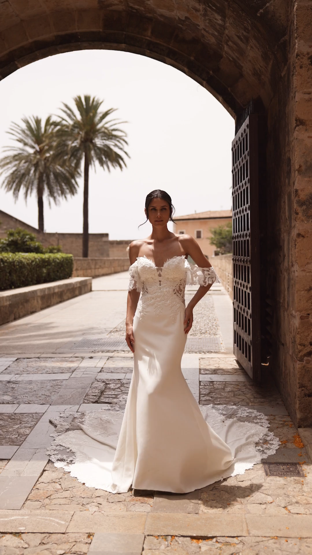 Bride In A Crepe Mermaid Wedding Dress With Lace Off The Shoulder Swag Sleeves Bride In A Crepe Mermaid Wedding Dress With Lace Off The Shoulder Swag Sleeves