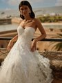 Closeup Shot Of Bride In Ivory Wedding Dress With Sweetheart Neckline Embellished With Beading and Lace