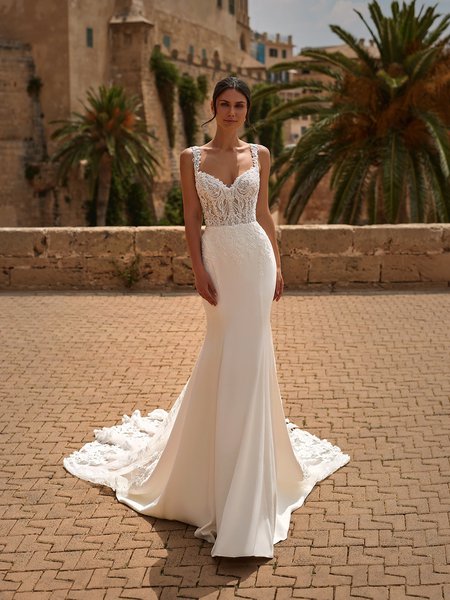 Moonlight Couture H1571 romantic lace wedding dresses with sleeves and beading make a statement.