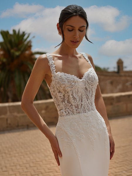 Closeup View of Bride Wearing A Sweetheart Lace Bodice Wedding Dress With Tank Straps