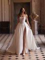 Moonlight Couture H1644 romantic lace wedding dresses with sleeves and beading make a statement.
