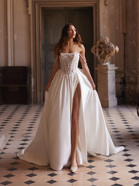 Moonlight Couture H1644 romantic lace wedding dresses with sleeves and beading make a statement.