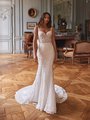 Moonlight Couture H1645 romantic lace wedding dresses with sleeves and beading make a statement.