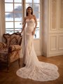 Moonlight Couture H1653 romantic lace wedding dresses with sleeves and beading make a statement.