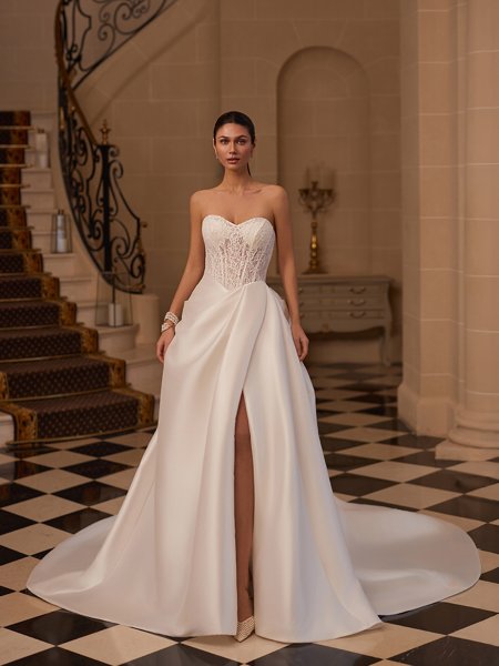 Moonlight Couture H1656 romantic lace wedding dresses with sleeves and beading make a statement.