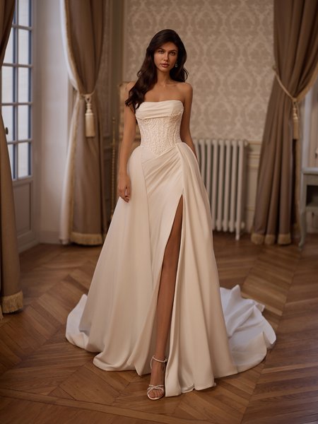 Moonlight Couture H1658 romantic lace wedding dresses with sleeves and beading make a statement.