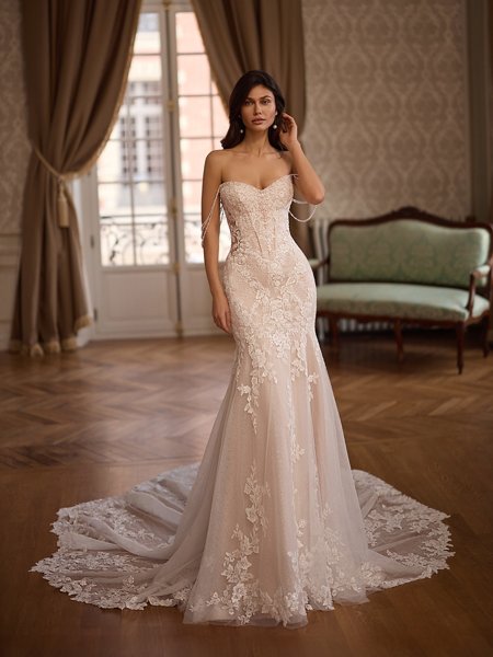 Moonlight Couture H1660 romantic lace wedding dresses with sleeves and beading make a statement.