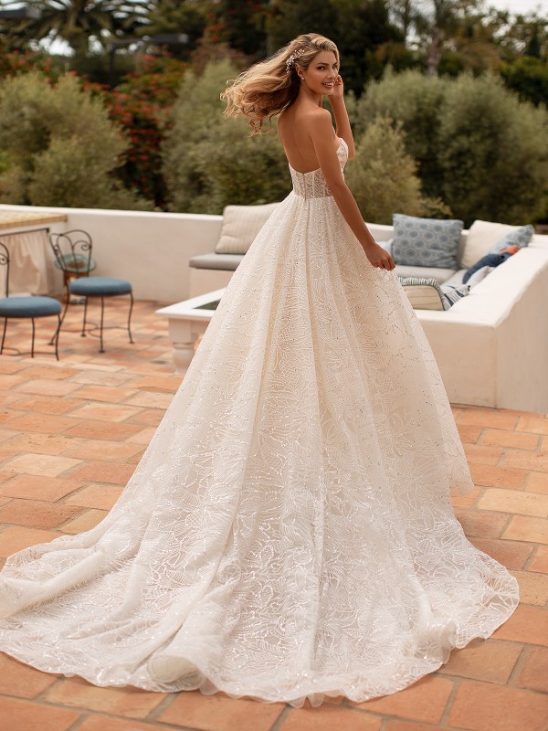 Moonlight Collection J6773 shimmery tulle a-line bridal gown with open back and semi-cathedral train Moonlight Collection J6773 shimmery tulle a-line bridal gown with open back and semi-cathedral train