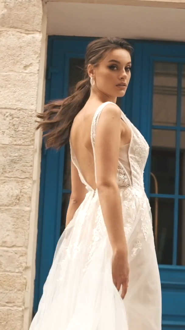 Moonlight Collection J6811 boho and romantic A-line bridal gown with beaded deep V-neck and illusion insets at side bodice Moonlight Collection J6811 boho and romantic A-line bridal gown with beaded deep V-neck and illusion insets at side bodice
