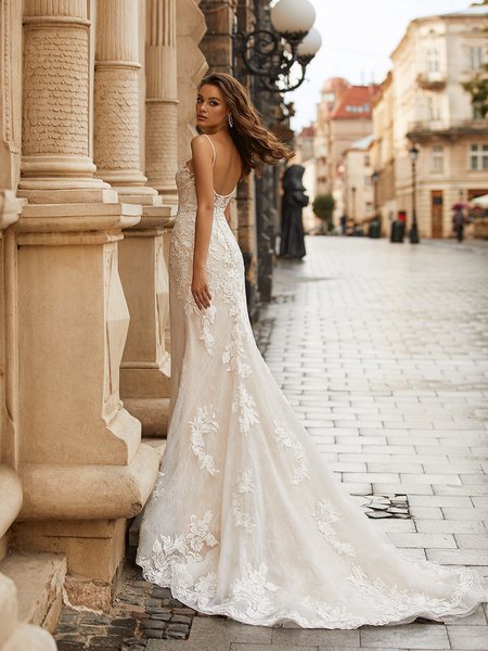 Moonlight Collection J6812 sophisticated deep illusion V-back trumpet gown with beaded lace appliques and lace trimmed chapel train Moonlight Collection J6812 sophisticated deep illusion V-back trumpet gown with beaded lace appliques and lace trimmed chapel train