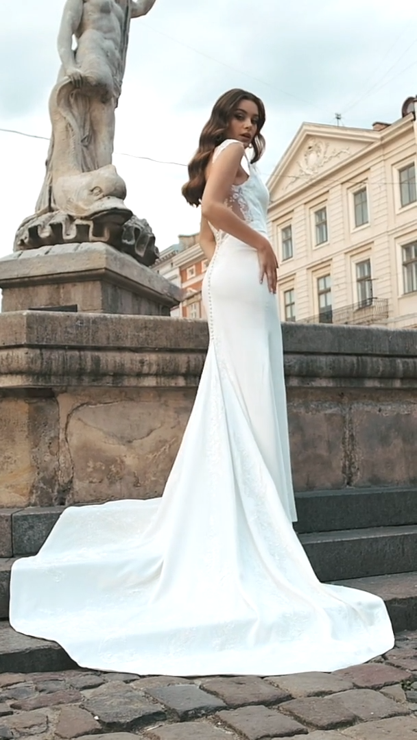 Moonlight Collection J6814 elegant illusion cap sleeves mermaid crepe wedding gown with low V-neckline and lace accented neckline and train Moonlight Collection J6814 elegant illusion cap sleeves mermaid crepe wedding gown with low V-neckline and lace accented neckline and train