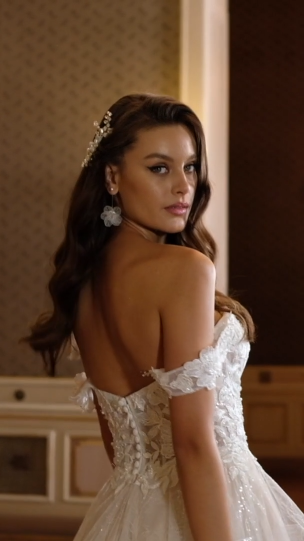 Moonlight Collection J6823 Illusion Off-The-Shoulder Floral Lace Sweetheart Bridal Gown With Sequin Floral Cascading Skirt Moonlight Collection J6823 Illusion Off-The-Shoulder Floral Lace Sweetheart Bridal Gown With Sequin Floral Cascading Skirt