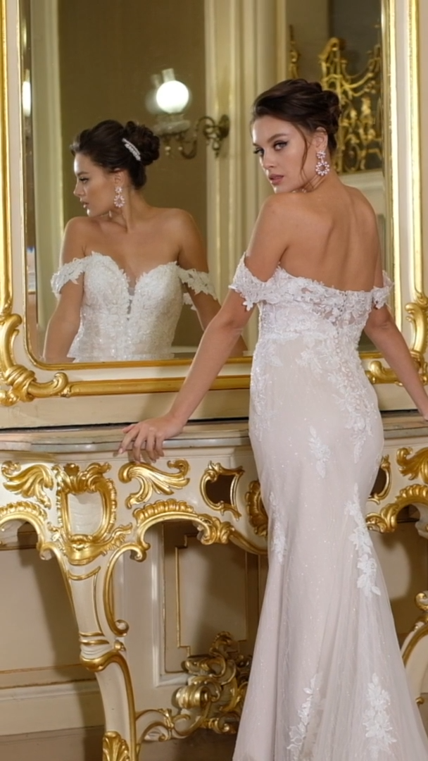 Moonlight Collection J6830 Glitter Floral Lace Off-The-Shoulder Mermaid Wedding Dress with Sheer Sparkle Train and Swag Sleeves Moonlight Collection J6830 Glitter Floral Lace Off-The-Shoulder Mermaid Wedding Dress with Sheer Sparkle Train and Swag Sleeves