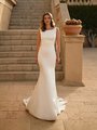 Bride Walking In Sleek Crepe Mermaid Wedding Dress With Bateau Neckline