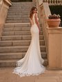 Back View of Bride on Staircase With Chapel Illusion Lace Train Over Steps