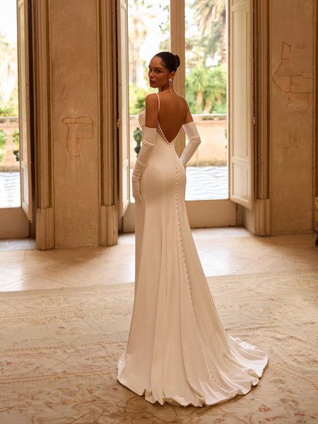 Moonlight Collection J6973 Beaded trim deep V-back duchess satin mermaid with buttons to end of sweep train Moonlight Collection J6973 Beaded trim deep V-back duchess satin mermaid with buttons to end of sweep train