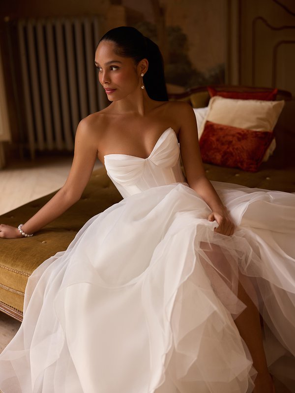 Moonlight Collection J6974 Mikado ruched pointed sweetheart bodice and organza cascades with horsehair trim hem A-line wedding dress