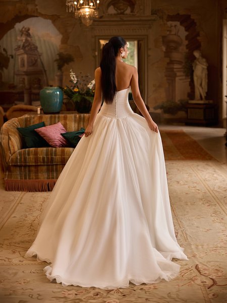 Moonlight Collection J6977 Pleated open back soft tulle A-line with sweep train and buttons along back bodice Moonlight Collection J6977 Pleated open back soft tulle A-line with sweep train and buttons along back bodice