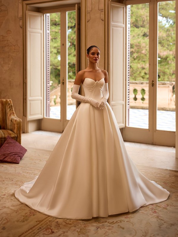 Moonlight Collection J6980 strapless pointed sweetheart with pearl drapings satin ball gown