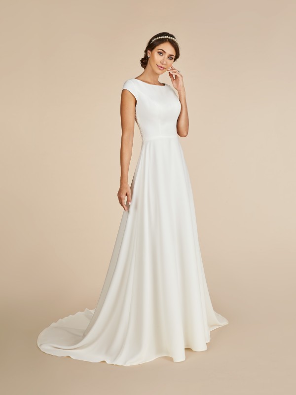 Ivory temple ready crepe A-line modest wedding dress with bateau neckline with cap sleeves