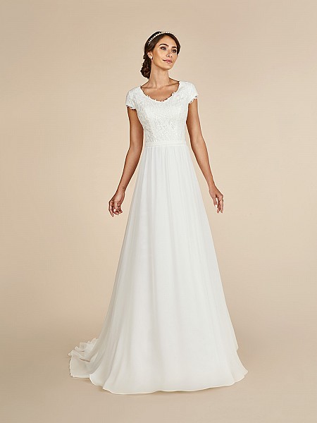 Elegant A-line dress with wide v-neck, lined cap sleeves, re-embroidered lace appliques and couture band at waist Elegant A-line dress with wide v-neck, lined cap sleeves, re-embroidered lace appliques and couture band at waist