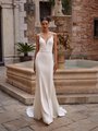 Bride in simple mermaid crepe wedding dress with sweetheart neckline and thin spaghetti straps
