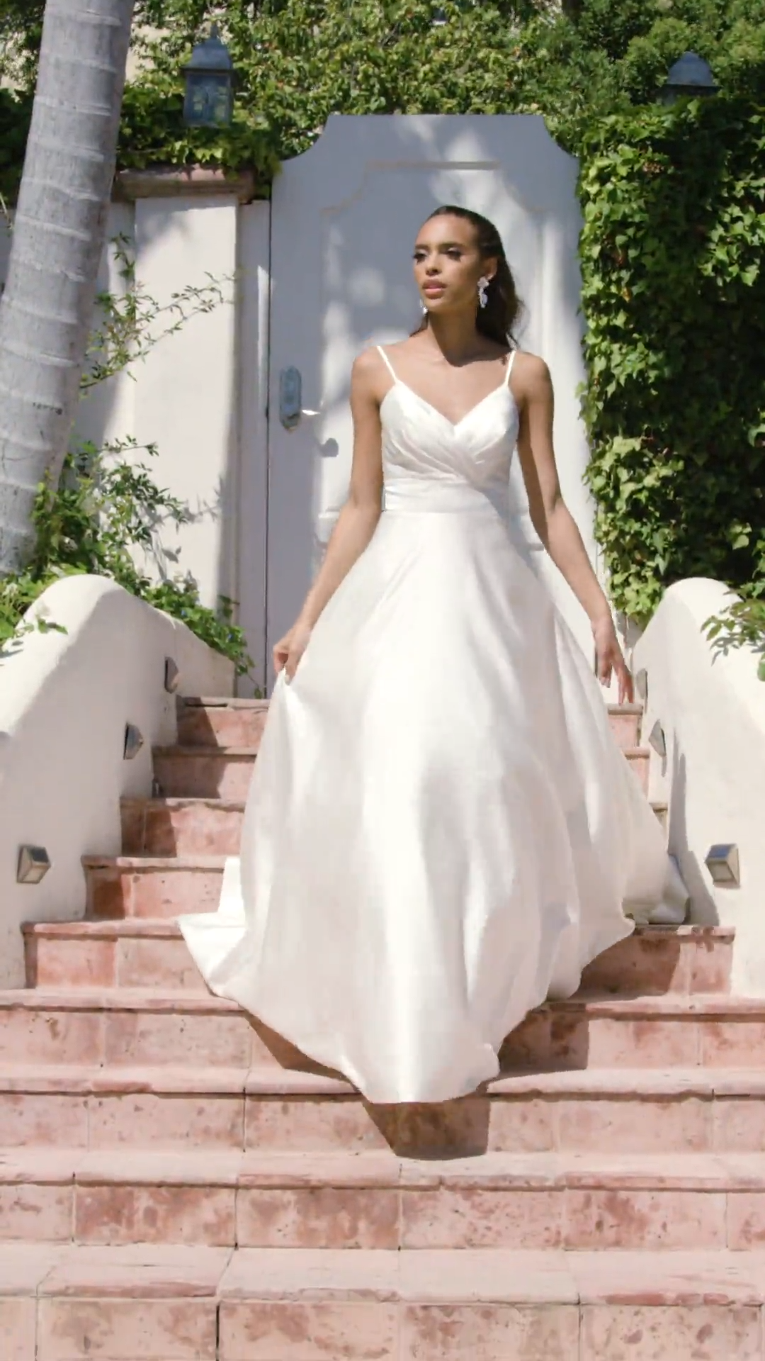Moonlight Tango T921 is a simple satin full A-line with surplice sweetheart and ruched front bodice and deep V-back with side pockets Moonlight Tango T921 is a simple satin full A-line with surplice sweetheart and ruched front bodice and deep V-back with side pockets