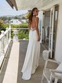 Moonlight Tango T922 sexy crepe wedding gown with a low back and illusion inset, beaded straps, and buttons to end of train